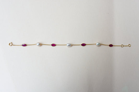 18K gold bracelet with ruby and pearl stations