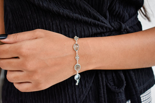 Blue gemstone bezel bracelet in silver with lobster clasp