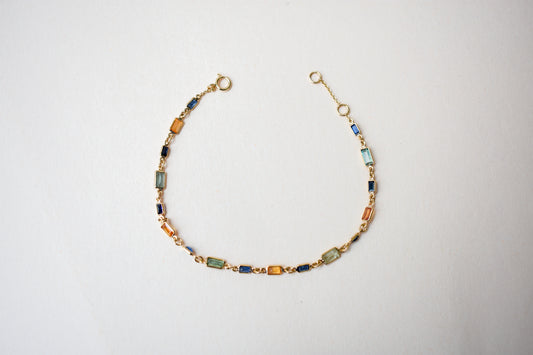 18K gold paperclip chain bracelet with multi-coloured sapphire stations