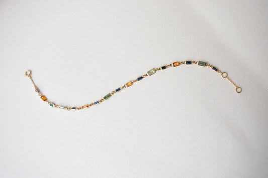 18K gold paperclip chain bracelet with multi-coloured sapphire stations
