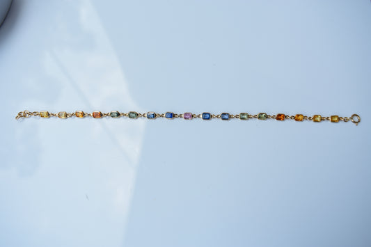 18K gold bracelet with multi-coloured sapphire stations