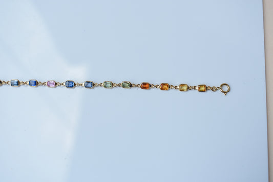 18K gold bracelet with multi-coloured sapphire stations