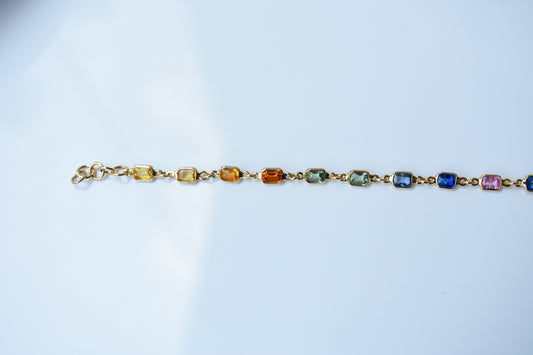 18K gold bracelet with multi-coloured sapphire stations