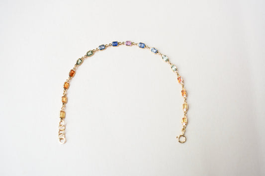 18K gold bracelet with multi-coloured sapphire stations