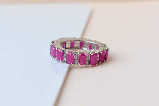 Vivid pink gemstone emerald-cut eternity ring in 925 silver