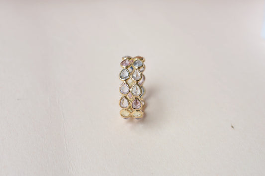 Pear-cut pastel multicolor sapphire eternity ring in 18K gold