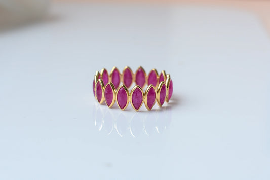Marquise-cut ruby zigzag double-row eternity ring in 18K gold