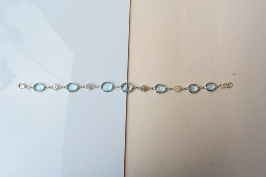 Blue gemstone bezel bracelet in silver with lobster clasp