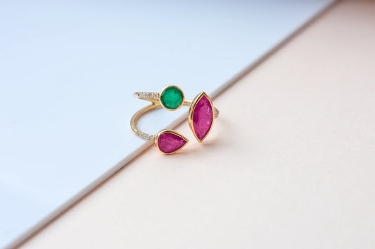 Emerald and ruby cluster ring in 18K gold with open split shank