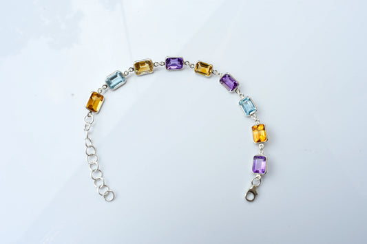 Citrine, amethyst, and blue topaz emerald-cut bracelet in 925 silver