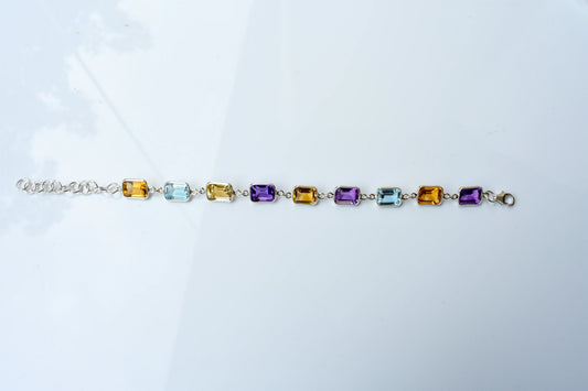 Citrine, amethyst, and blue topaz emerald-cut bracelet in 925 silver