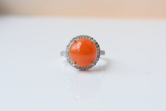 Round carnelian cabochon ring with cubic zirconia halo in 925 silver