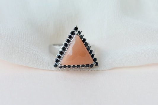 Triangular sunstone ring with black spinel halo in 925 silver