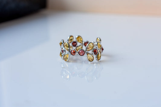 Citrine and garnet flower link eternity band in 925 silver