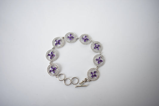 Amethyst flower halo bracelet with cubic zirconia pave links in 925 silver