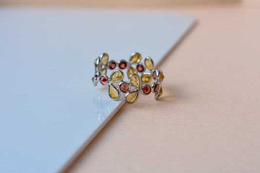Citrine and garnet flower link eternity band in 925 silver