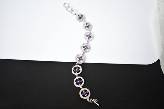 Amethyst flower halo bracelet with cubic zirconia pave links in 925 silver