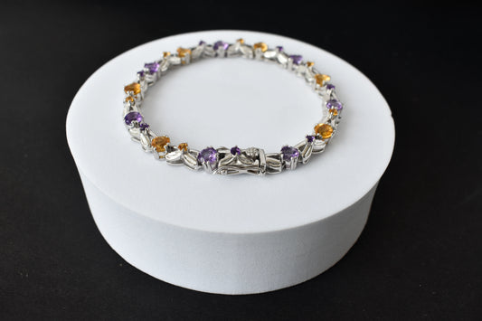 Amethyst and citrine tennis bracelet with alternating round stones in 925 silver