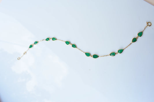 18K gold bracelet with pear-cut emerald drops