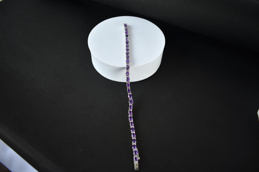 Oval-cut amethyst tennis bracelet with cubic zirconia accents in 925 silver