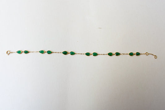 18K gold bracelet with pear-cut emerald drops