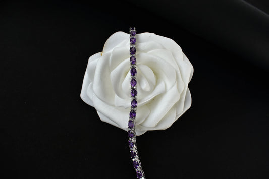 Oval-cut amethyst tennis bracelet with cubic zirconia accents in 925 silver