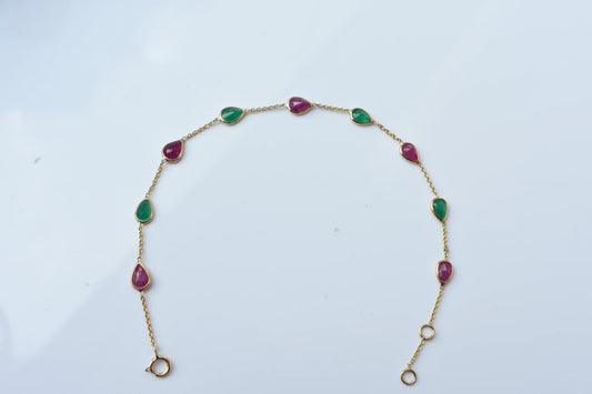 18K gold bracelet with alternating ruby and emerald drops