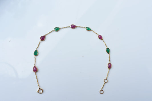 18K gold bracelet with alternating ruby and emerald drops