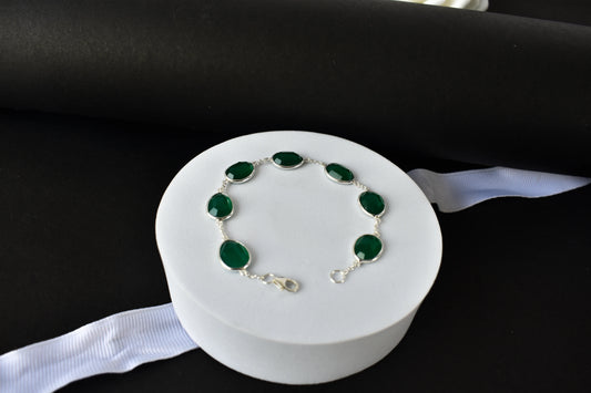 Faceted green onyx bracelet with bezel-set stones in 925 silver