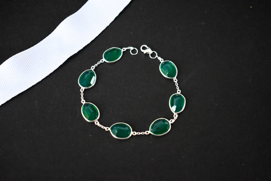 Faceted green onyx bracelet with bezel-set stones in 925 silver