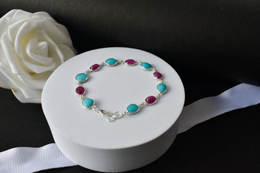 Ruby and turquoise cabochon bracelet with bezel-set stones in 925 silver
