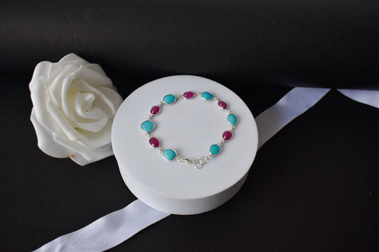 Ruby and turquoise cabochon bracelet with bezel-set stones in 925 silver