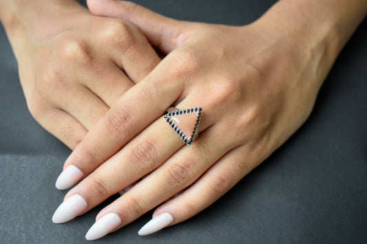 Triangular sunstone ring with black spinel halo in 925 silver