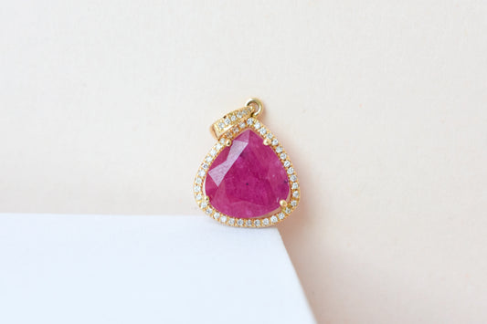 18K gold pendant with rose-cut ruby and diamond halo