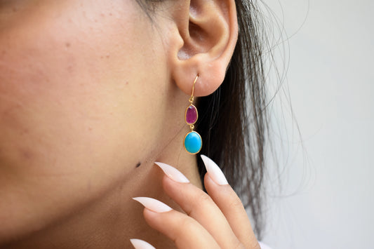 18K gold earrings with a rose quartz gemstone