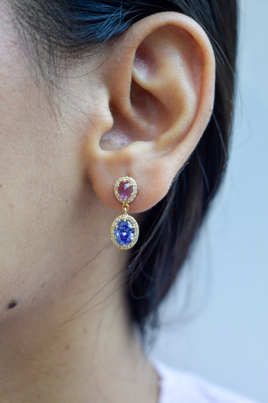 Gold drop earrings with pink and blue sapphire diamond halos