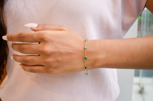 18K gold bracelet with emerald and blue sapphire stations