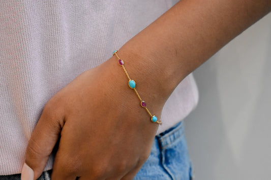 18K gold bracelet with turquoise and ruby stations