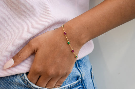 18K gold bracelet with alternating ruby and emerald drops