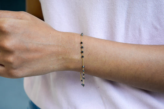 18K gold bracelet with clustered black diamond beads