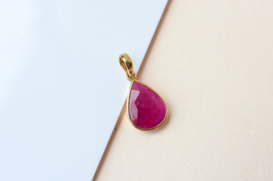 18K gold pendant with bezel-set rose-cut pear ruby