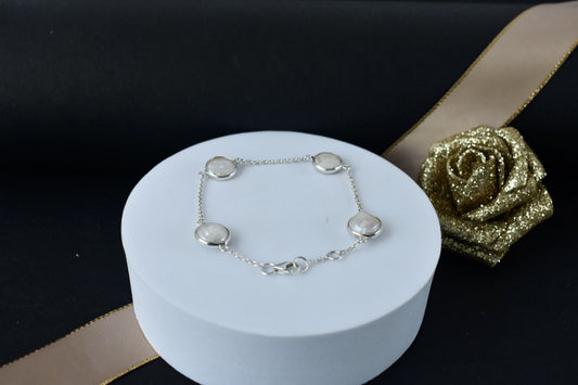 Coin pearl station bracelet with bezel-set pearls on a 925 silver chain