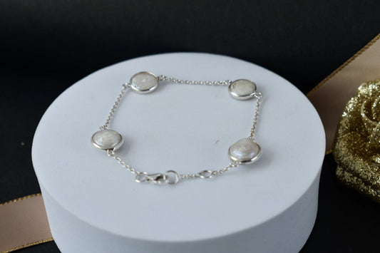 Coin pearl station bracelet with bezel-set pearls on a 925 silver chain
