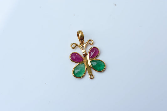 18K gold butterfly pendant with ruby and emerald pear-shaped wings