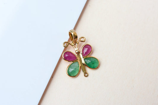 18K gold butterfly pendant with ruby and emerald pear-shaped wings