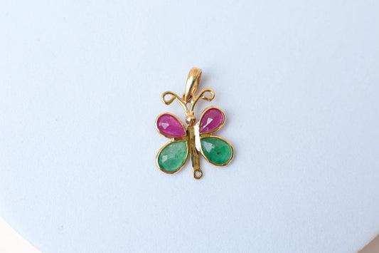 18K gold butterfly pendant with ruby and emerald pear-shaped wings