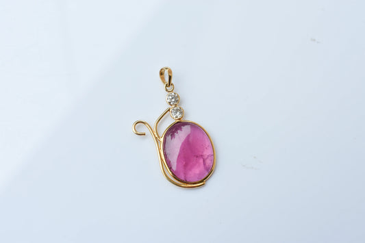 18K gold pendant with cabochon pink tourmaline and diamond accents