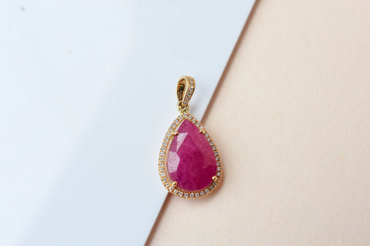 18K gold pendant with large rose-cut pear ruby and diamond halo