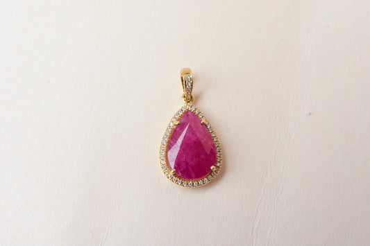 18K gold pendant with large rose-cut pear ruby and diamond halo