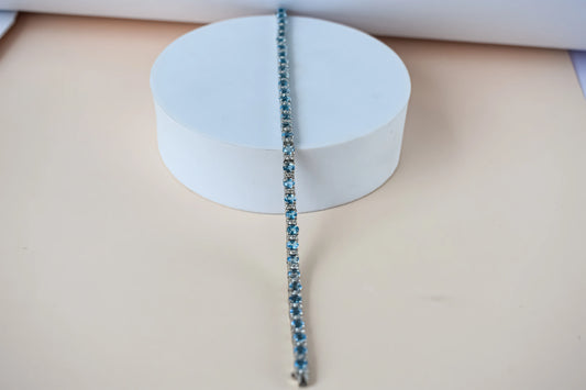 Swiss Blue Topaz tennis bracelet in 925 silver with cubic zirconia